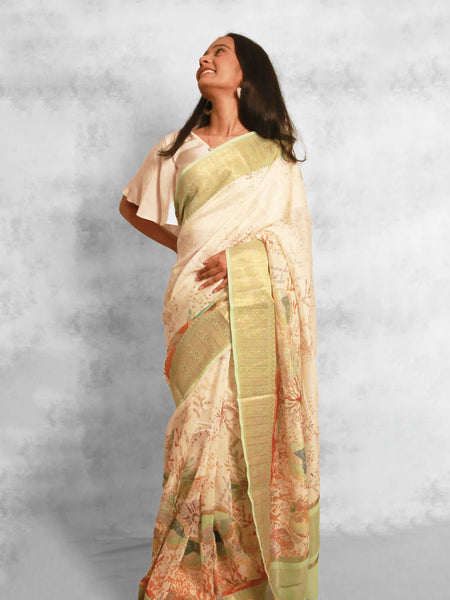 Soft sea symphony Neutral Peach Chanderi Zari Woven Saree with Aqua Green Border Elegance