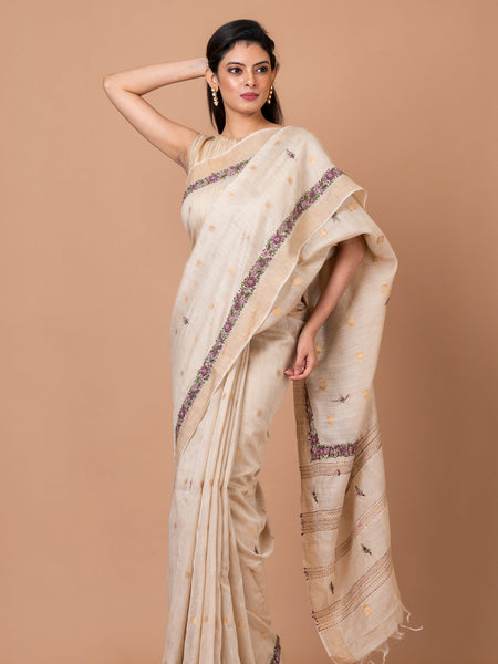 Charming Blossoms Elegant Cream Linen Silk Saree with Zari Border Buta Work – Designer Saree