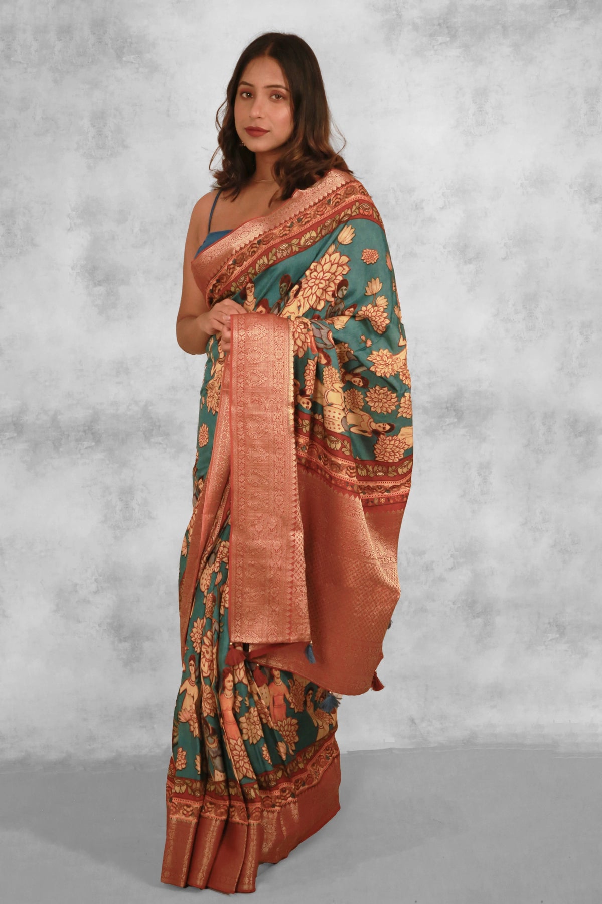 Figurative charms Classic Peacock Green Chanderi Saree with Lightweight Zari Draping