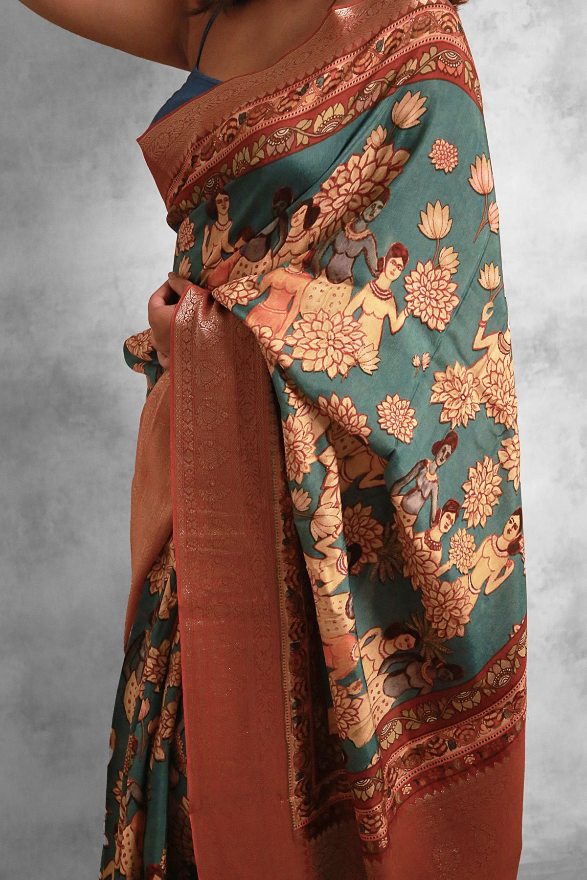 Figurative charms Classic Peacock Green Chanderi Saree with Lightweight Zari Draping
