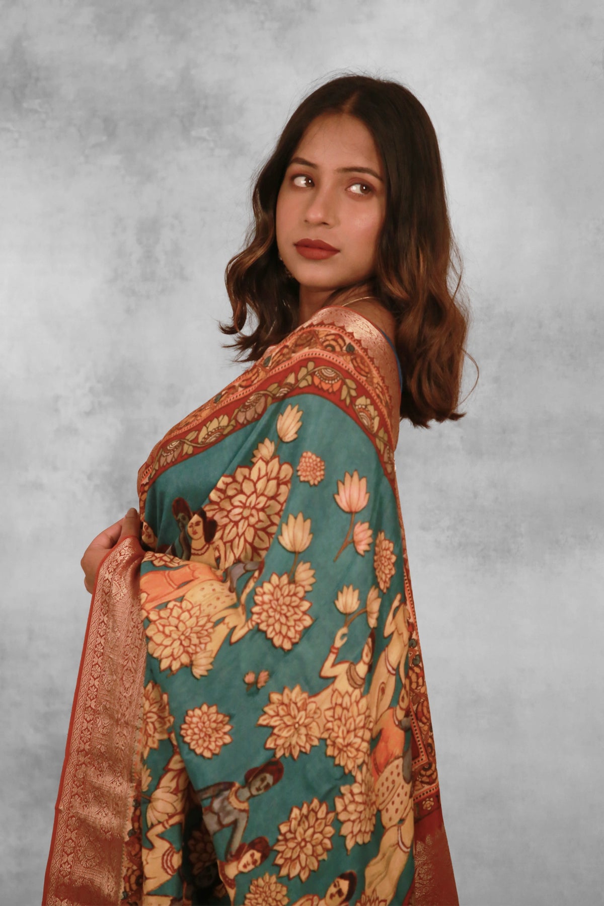 Figurative charms Classic Peacock Green Chanderi Saree with Lightweight Zari Draping