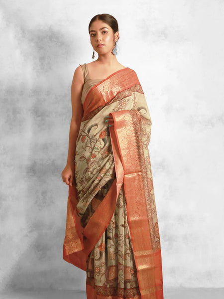 Wildflower elegance Elegant Pale Green Chanderi Zari Saree with Contrast Orange Border