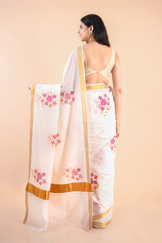 Devyani | Floral Kerala Cotton Kasavu Saree with Golden Border