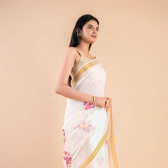 Devyani | Floral Kerala Cotton Kasavu Saree with Golden Border