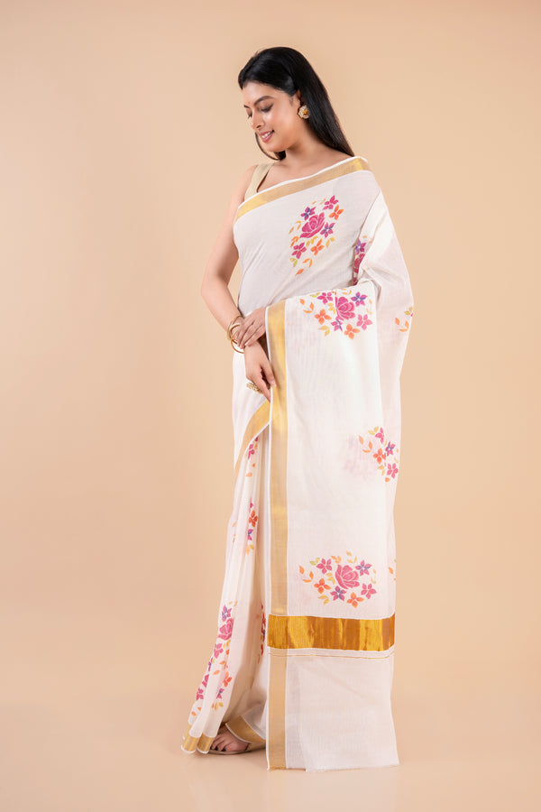 Devyani | Floral Kerala Cotton Kasavu Saree with Golden Border