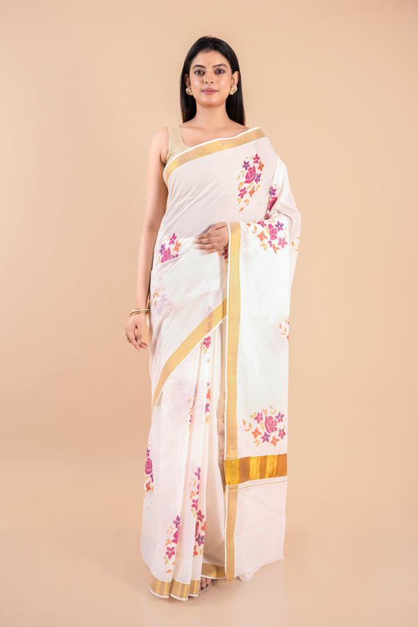 Devyani | Floral Kerala Cotton Kasavu Saree with Golden Border
