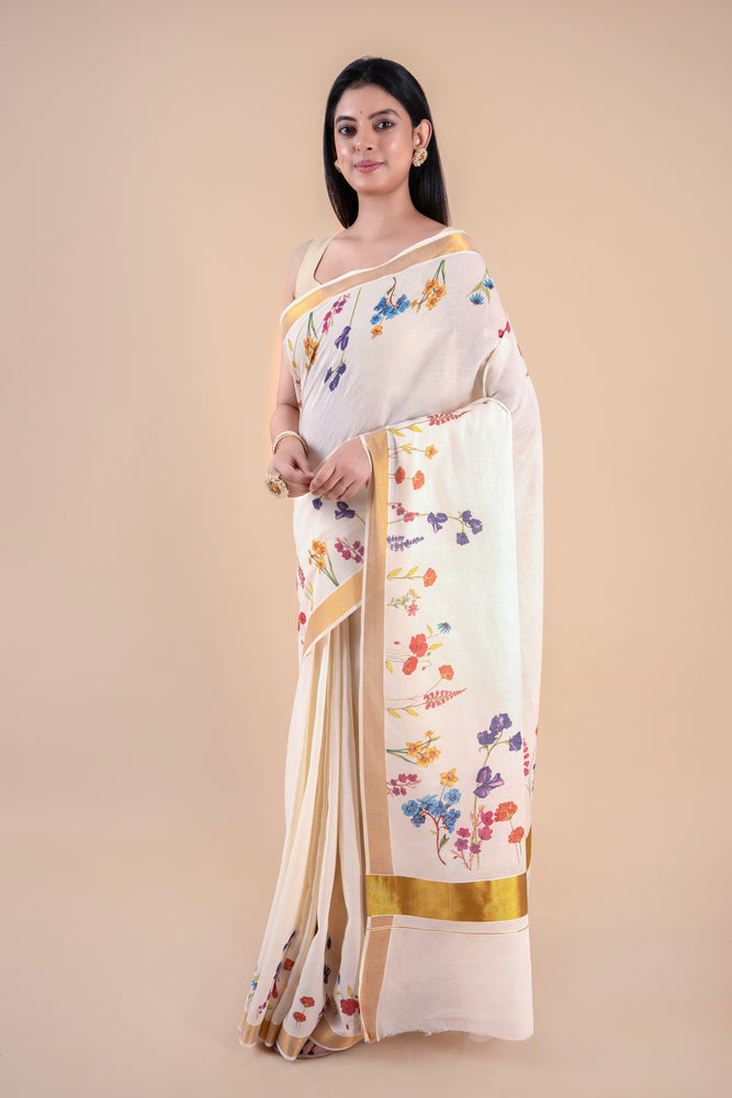 Nandana | Classic Kerala Cotton Kasavu Saree with Floral Design & Golden Zari Border
