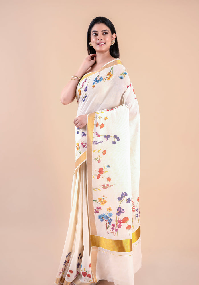 Nandana | Classic Kerala Cotton Kasavu Saree with Floral Design & Golden Zari Border