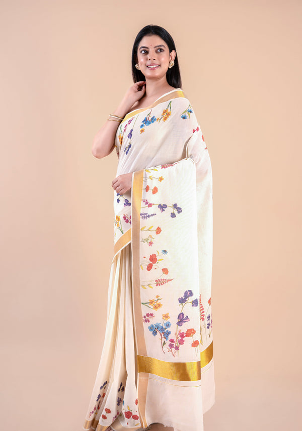 Nandana | Classic Kerala Cotton Kasavu Saree with Floral Design & Golden Zari Border