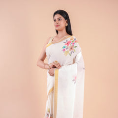 Suvasini | Traditional Kasavu Saree in Kerala Cotton with Floral Design & Gold Border