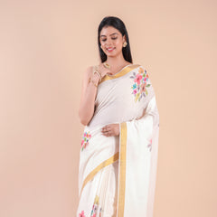 Suvasini | Traditional Kasavu Saree in Kerala Cotton with Floral Design & Gold Border