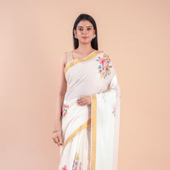 Suvasini | Traditional Kasavu Saree in Kerala Cotton with Floral Design & Gold Border