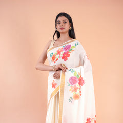 Ishani | Floral Kerala Cotton Kasavu Saree with Golden Border