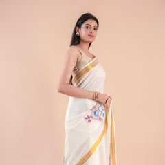 Nilambari | Floral Motif Kerala Cotton Kasavu Saree with Gold Border