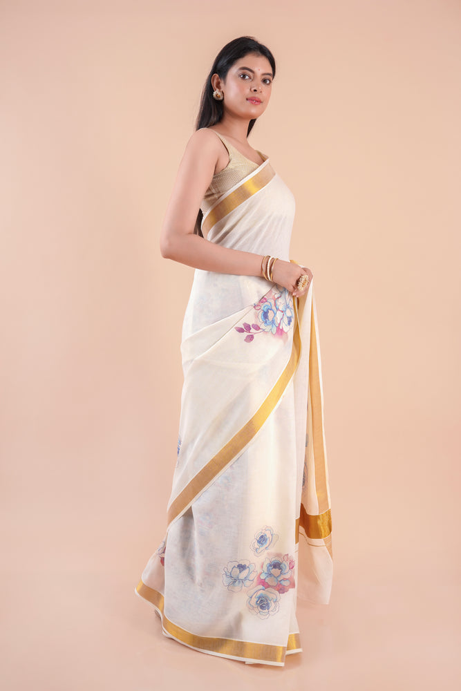 Nilambari | Floral Motif Kerala Cotton Kasavu Saree with Gold Border