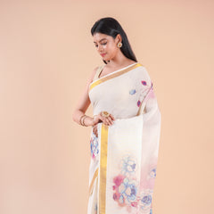 Nilambari | Floral Motif Kerala Cotton Kasavu Saree with Gold Border