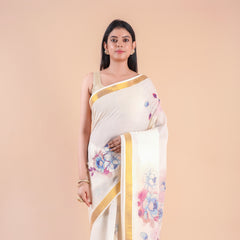 Nilambari | Floral Motif Kerala Cotton Kasavu Saree with Gold Border