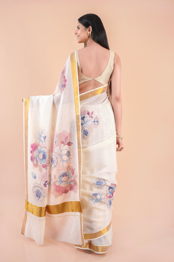 Nilambari | Floral Motif Kerala Cotton Kasavu Saree with Gold Border