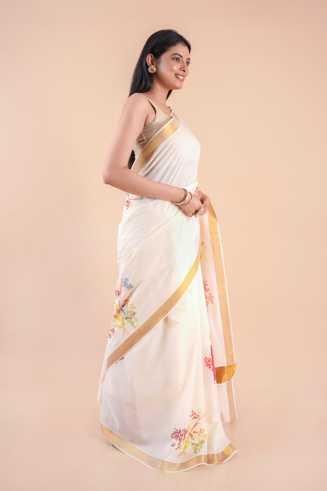 Thiruva | Floral Design Kerala Cotton Kasavu Saree with Golden Zari Border