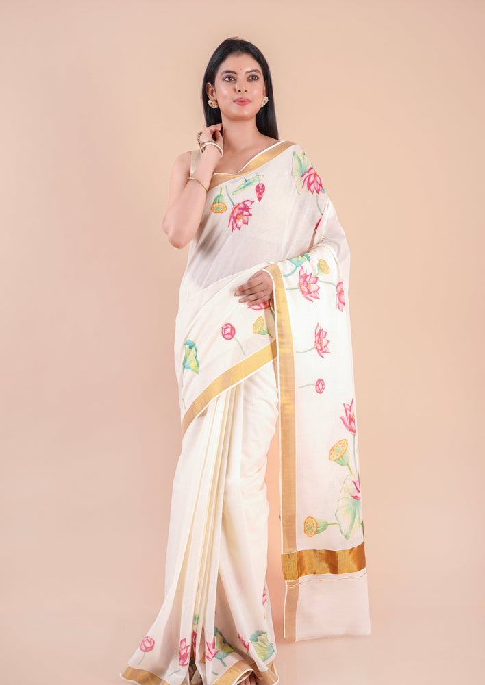 Onika | Traditional Kasavu Saree in Kerala Cotton with Floral Design & Gold Border