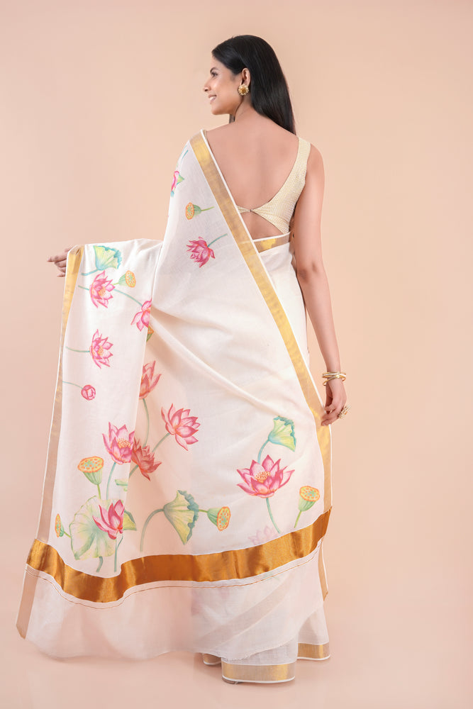 Onika | Traditional Kasavu Saree in Kerala Cotton with Floral Design & Gold Border