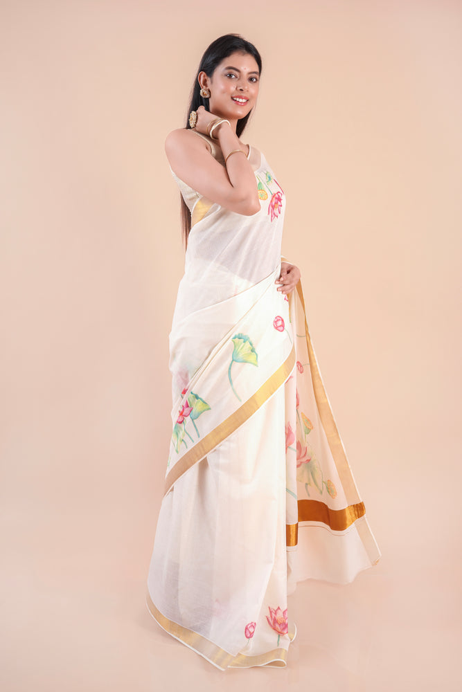 Onika | Traditional Kasavu Saree in Kerala Cotton with Floral Design & Gold Border