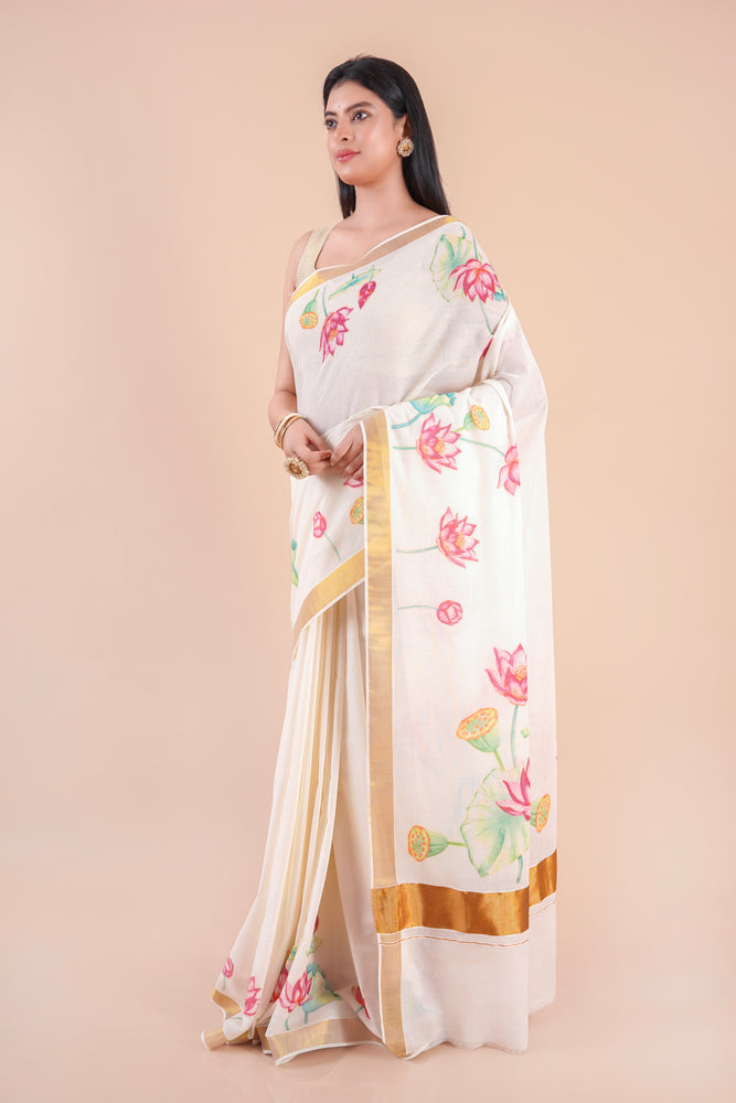 Onika | Traditional Kasavu Saree in Kerala Cotton with Floral Design & Gold Border