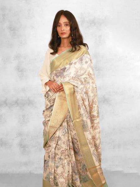 Wishpering petals in blue Premium Ivory and Peacock Green Chanderi Saree with Zari Weaving Detail