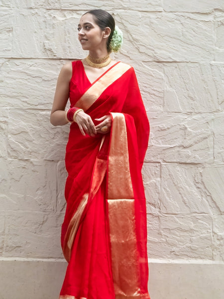 Sindoori elegance Women’s Red Khaddi Woven Saree with Ethnic Golden Border