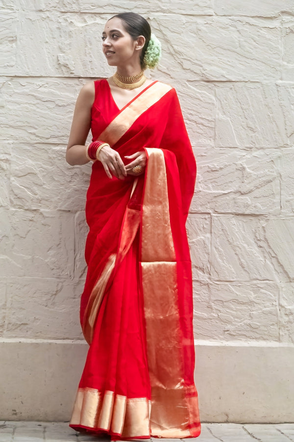 Sindoori elegance Women’s Red Khaddi Woven Saree with Ethnic Golden Border