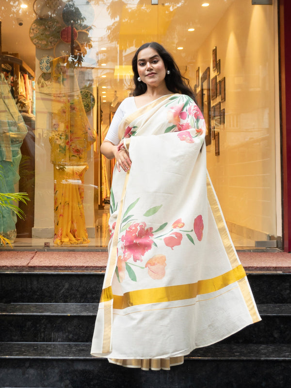 kasturi | Women’s White Saree with Golden Zari Traditional Floral Design