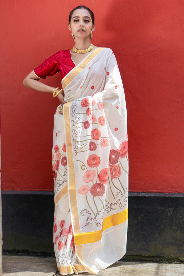 Poppy charm | Premium White Kasavu Saree with Golden Border and Floral Print