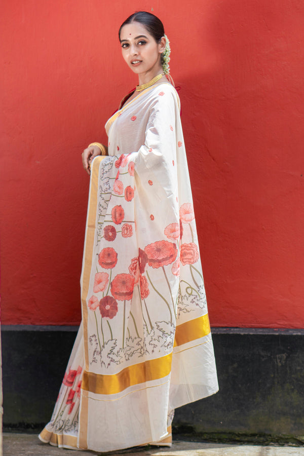 Poppy charm | Premium White Kasavu Saree with Golden Border and Floral Print