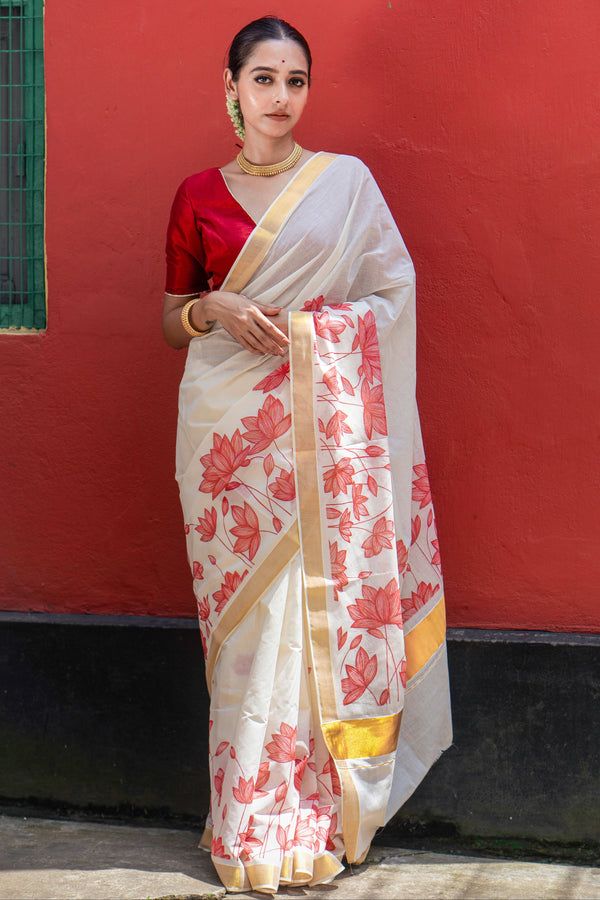 Padma rekha Traditional White Cotton Kasavu Saree with Floral Pattern & Zari Border