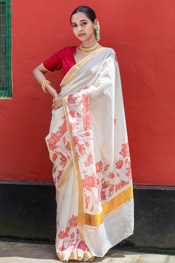 Padma rekha Traditional White Cotton Kasavu Saree with Floral Pattern & Zari Border