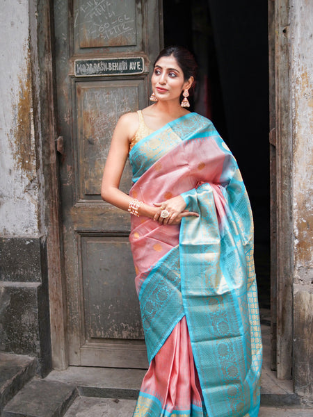 Damayanti Handwoven Gadwal Silk Saree in Astel Pink with Aqua Blue Border & Elegant Zari Work