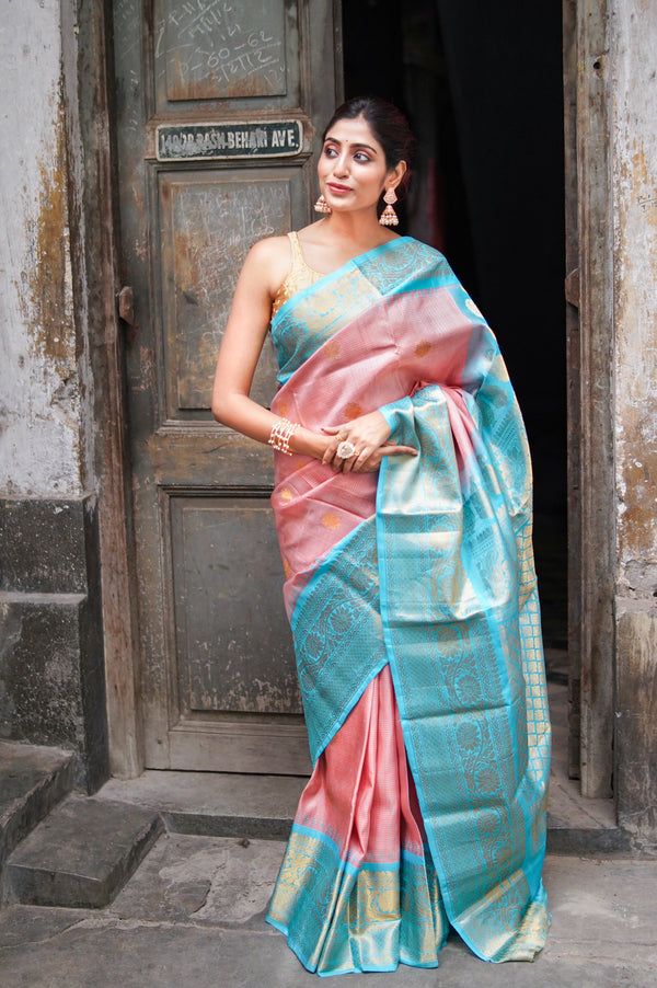 Damayanti Handwoven Gadwal Silk Saree in Astel Pink with Aqua Blue Border & Elegant Zari Work