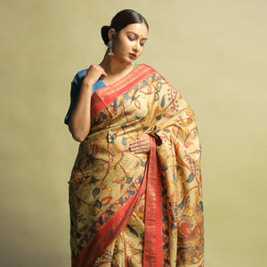 Tamaharini Elegant Mustard Tussar Silk Saree with Zari Border – Traditional & Festive Ethnic Wear