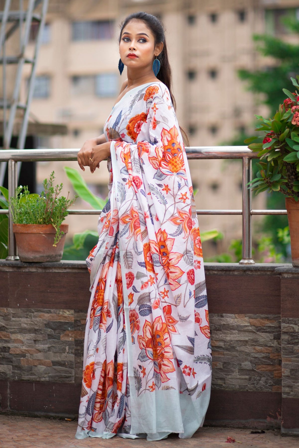 hazel Lightweight White Mulmul Saree with Watercolor Leaf Floral Design